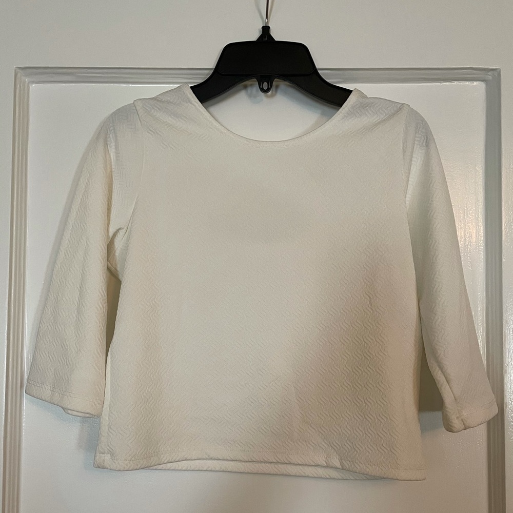 White 3/4 sleeve top with back cut out